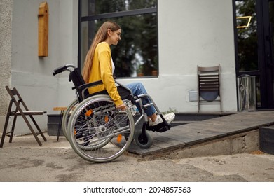 A Female Student In Wheelchair At The Ramp