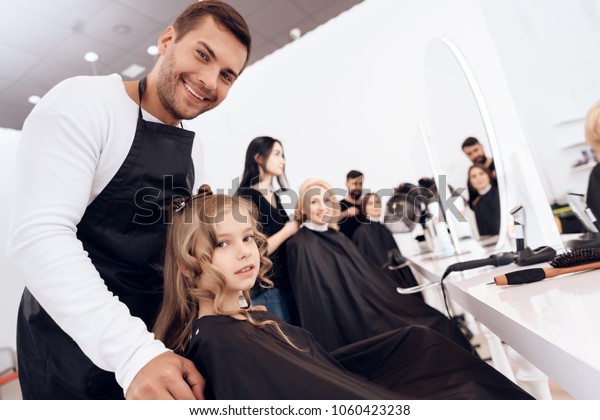Female Stylist Does Haircut Little Girl Stock Photo Edit
