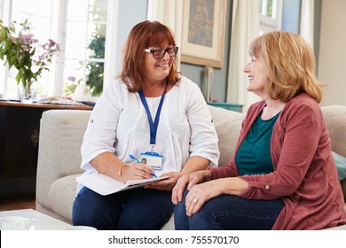 Female Support Worker Visits Senior Woman At Home