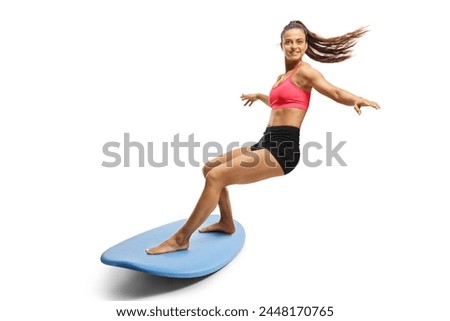 Similar – Image, Stock Photo Young surfer woman in bikini going surfing stands with surfboard on the black sandy beach. Girl walks with longboard. Extreme water sport by the ocean, sea. Healthy Active Lifestyle. Summer Vacation