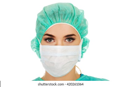 Female surgeon doctor in protective mask - Powered by Shutterstock