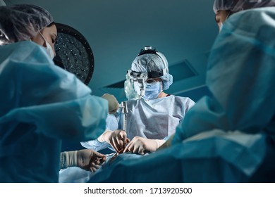 Female Surgeon During Surgery. A Team Of Surgeons Makes An Operation. Saving Lives, Modern Medicine