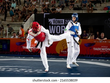 Female Taekwondo Fighter Kick During Match. World Taekwondo Championship, Rome, Italy, June 4 2022