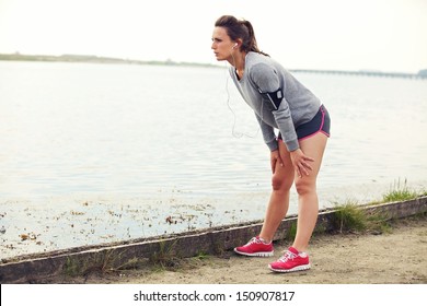 Female taking a break after running - Powered by Shutterstock