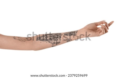 Female tattooed hand on white background