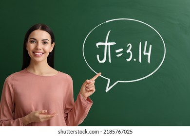 Female Teacher Near Blackboard With Written Number Pi 