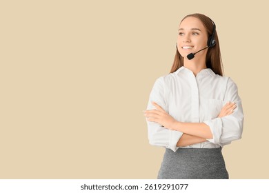 Female technical support agent in headset on beige background