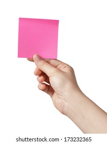 female teen hand holding purple sticky note, isolated on white