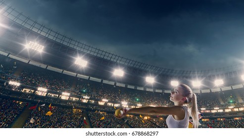 Female Tennis Player In Action During Game On The Professional Stadium Full Of People. The Stadium Is Made In 3D With Crowd.