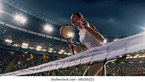 Female tennis player celebrates a win on the professional stadium full of people. She is wearing unbranded sport clothes. The stadium is made in 3D. - Powered by Shutterstock