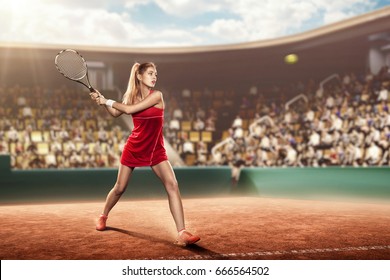 female tennis player in pink tennis apparel on court with a racket ready to hit a ball - Powered by Shutterstock