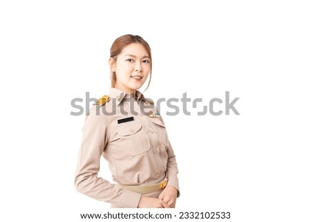 Female Thai government officer in khaki uniforms looking at camera a smiley face with hands clasped in front on isolated white background. Concept of advertising, product, sale promotion, presentation