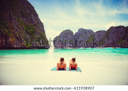 Female tourist laying at Phi Phi Maya Bay in the summer of Krabi, Thailand