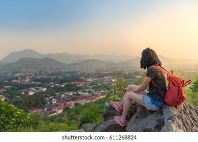 Female Tourist On Luang Prabang City View Point Sunset