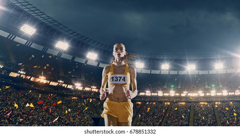 Female Track And Field Runner On The Professional Sports Arena With Bleaches Full Of People. Athlete Wears Unbranded Clothes. Arena And People On It Are Made In 3D And Animated.