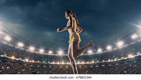 Female Track And Field Runner On The Professional Sports Arena With Bleaches Full Of People. Athlete Wears Unbranded Clothes. Arena And People On It Are Made In 3D And Animated.