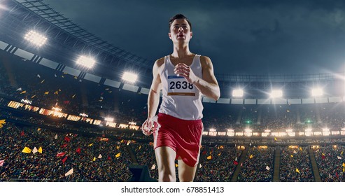 Female Track And Field Runner On The Professional Sports Arena With Bleaches Full Of People. Athlete Wears Unbranded Clothes. Arena And People On It Are Made In 3D And Animated.