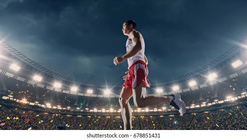 Female Track And Field Runner On The Professional Sports Arena With Bleaches Full Of People. Athlete Wears Unbranded Clothes. Arena And People On It Are Made In 3D And Animated.