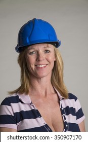 Female Tradesperson Wearing A Hardhat