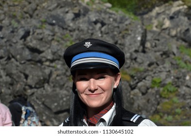 Female Train Conductor On The Famous Flam Railway Station. June 17,2018. Flam, Norway, Scandinavia.