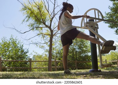 Female Trainer In A Public Gym In A Park