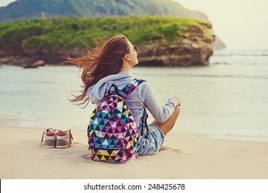 female traveler admiring a marine view ("instagram" filter applied)