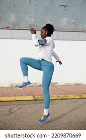 Female Urban Athlete On Hiit Training Doing Explosive Running Technique Exercise. Cardio Training Outside.