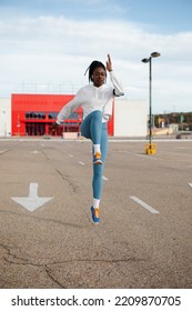 Female Urban Athlete On Hiit Training Doing Explosive Running Technique Exercise. Cardio Training Outside.