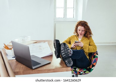 Female using cellphone at work