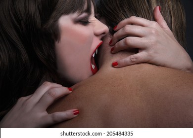 Female Vampire Bites Man In The Neck