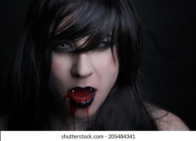 Female Vampire With Bloody Mouth