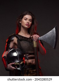 Female Viking Warrior With Axe And Helmet