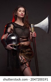 Female Viking Warrior With Axe And Helmet