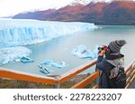 Female Visitor Shooting Photos of Perito Moreno Glacier, an Incredible UNESCO World Heritage Site in Patagonia, Argentina, South America