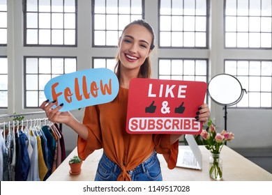 Female vlogger asking online audience to like and subscribe to her channel, daily videos - Shutterstock ID 1149517028