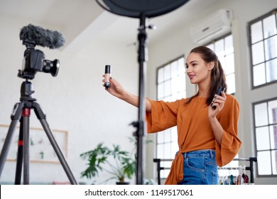 Female Vlogger Influencer Showing Product While Stock Photo 1149517061 ...