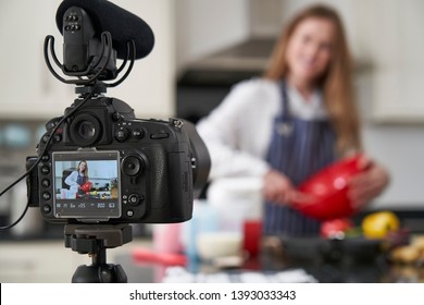 Female Vlogger Making Social Media Video About Cooking For The Internet - Powered by Shutterstock