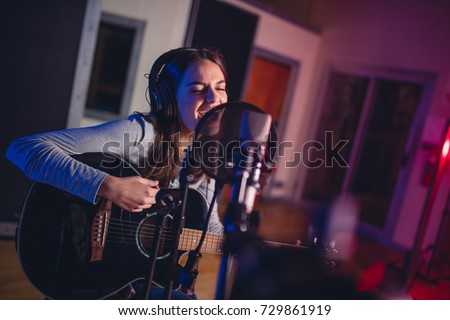 Similar – Image, Stock Photo Young woman recording with smartphone stabilizer outdoors