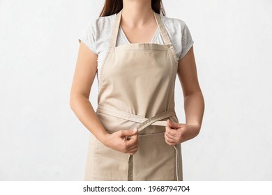 Female Waiter Wearing Apron On White Background