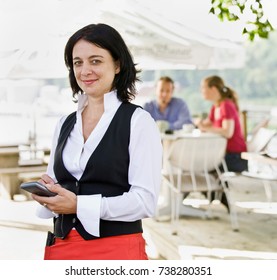 Female waitress taking orders - Powered by Shutterstock