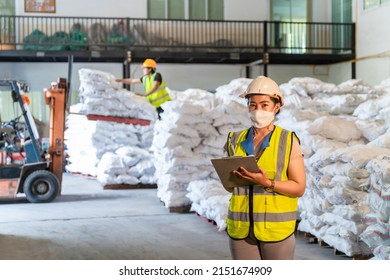 A Female Warehouse Wear A Mask Working In Alum Or Chemical Warehouse Storage. International Export Business Concept.