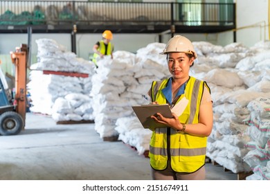 A Female Warehouse Working In Alum Or Chemical Warehouse Storage. International Export Business Concept.