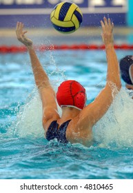 A Female Water Polo Goalie Misses A Shot