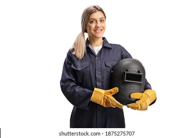 Female welder in a uniform holding a protective helmet isolated on white background