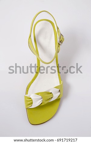 Female White and Green Sandal on White Background, Isolated Product, Top View, Studio.