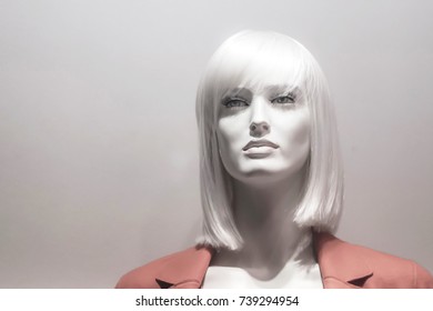 Female Window Doll On Grey Background