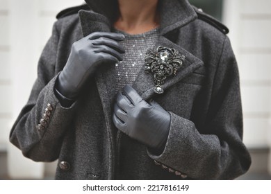 Female Woolen Warm Gray Double Breasted Coat And Leather Gloves. Stylish Details Of Fashionista. Woman Fashion Outerwear