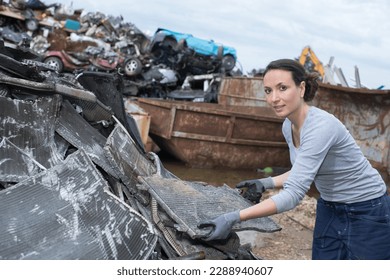 female worker at the junkyard