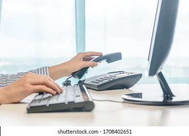 Female working, hands using computer telephone, closeup - Shutterstock ID 1708402651