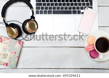 female workspace. accessories white wooden background